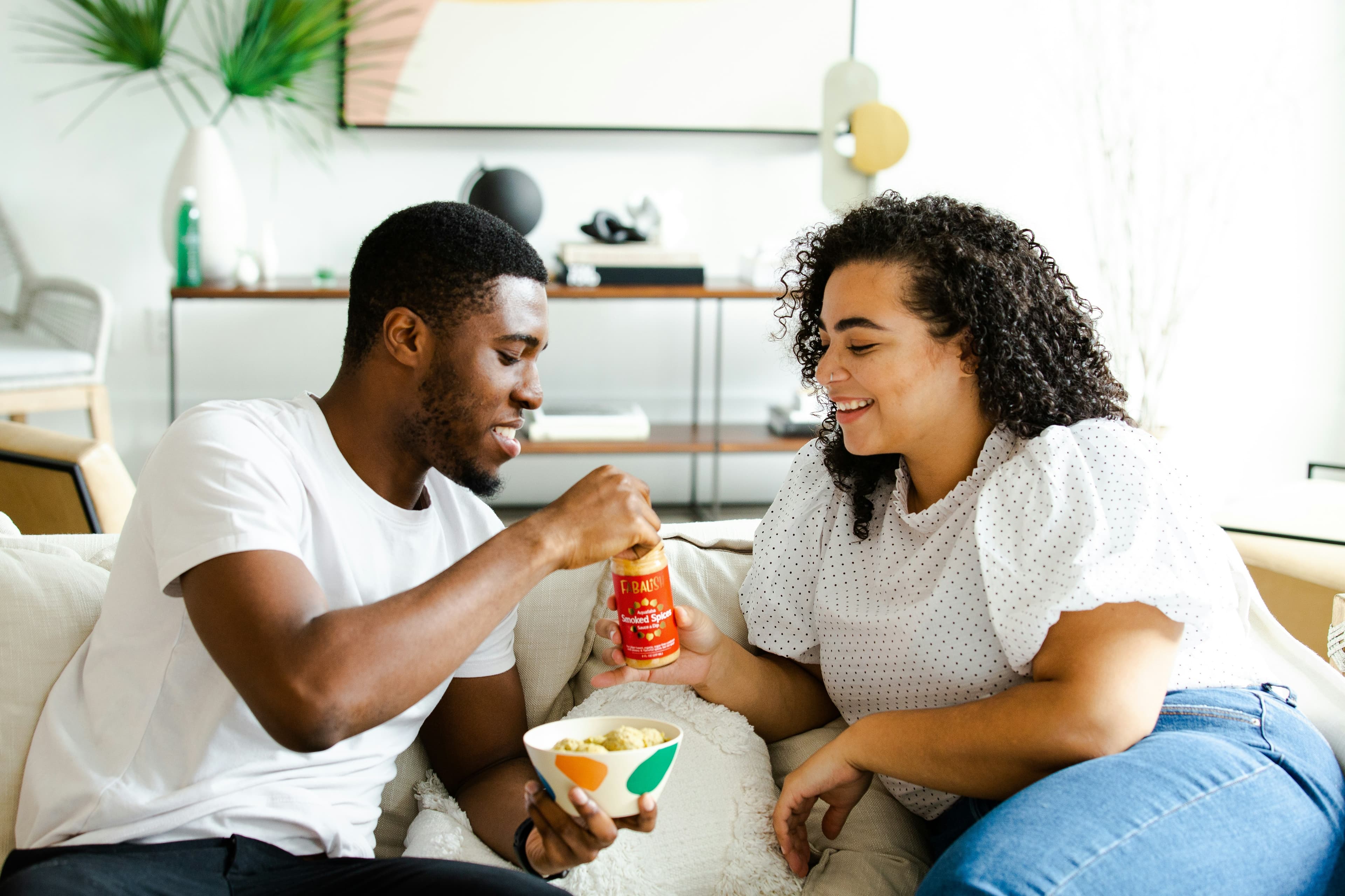 Couple relaxing together in their living room